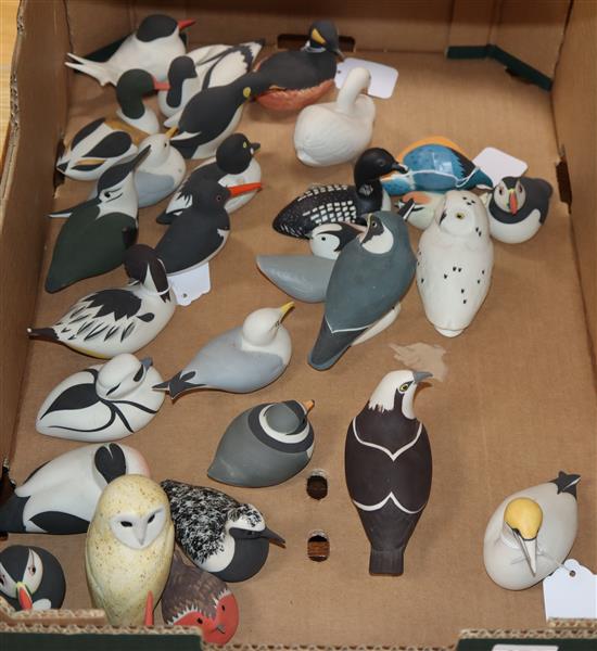 Isle of Arran, Scotland, a collection of 31 pottery birds, together with a shelved display case